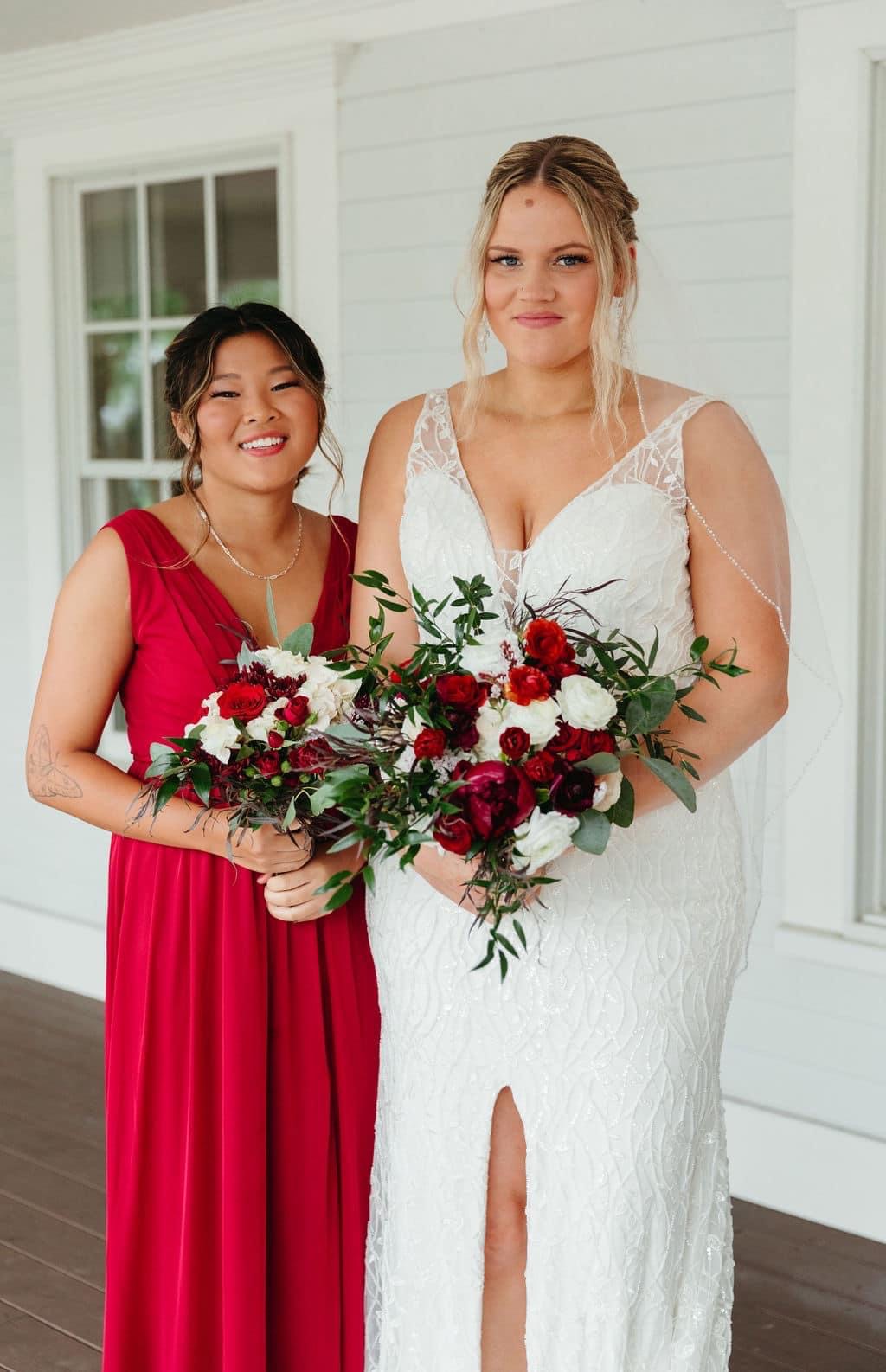 Bride and bridesmaid with bouquets