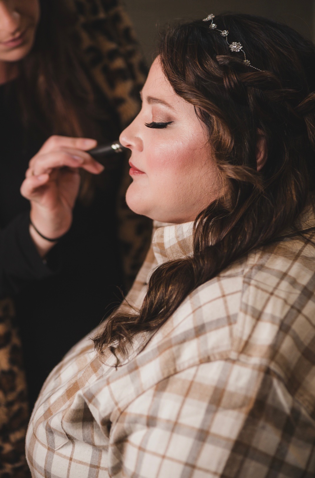 Christina applying bridal makeup